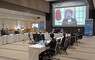 　「国際賢人会議」の第4回会合で流れた上川外相のビデオメッセージ＝21日午前、横浜市