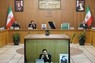 閣議で演説するイランのモフベル大統領代行（左から2番目）＝テヘランで20日、イラン大統領府提供・WANAロイター