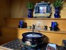沖縄の仏壇。奥に祖先をまつる「トートーメー」が置かれている＝2023年1月3日、宮城裕也撮影