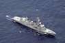 海上自衛隊のヘリコプター2機が墜落した伊豆諸島の鳥島東方海域で捜索に当たる海自の艦船＝2024年4月22日午前10時48分、本社機「希望」から